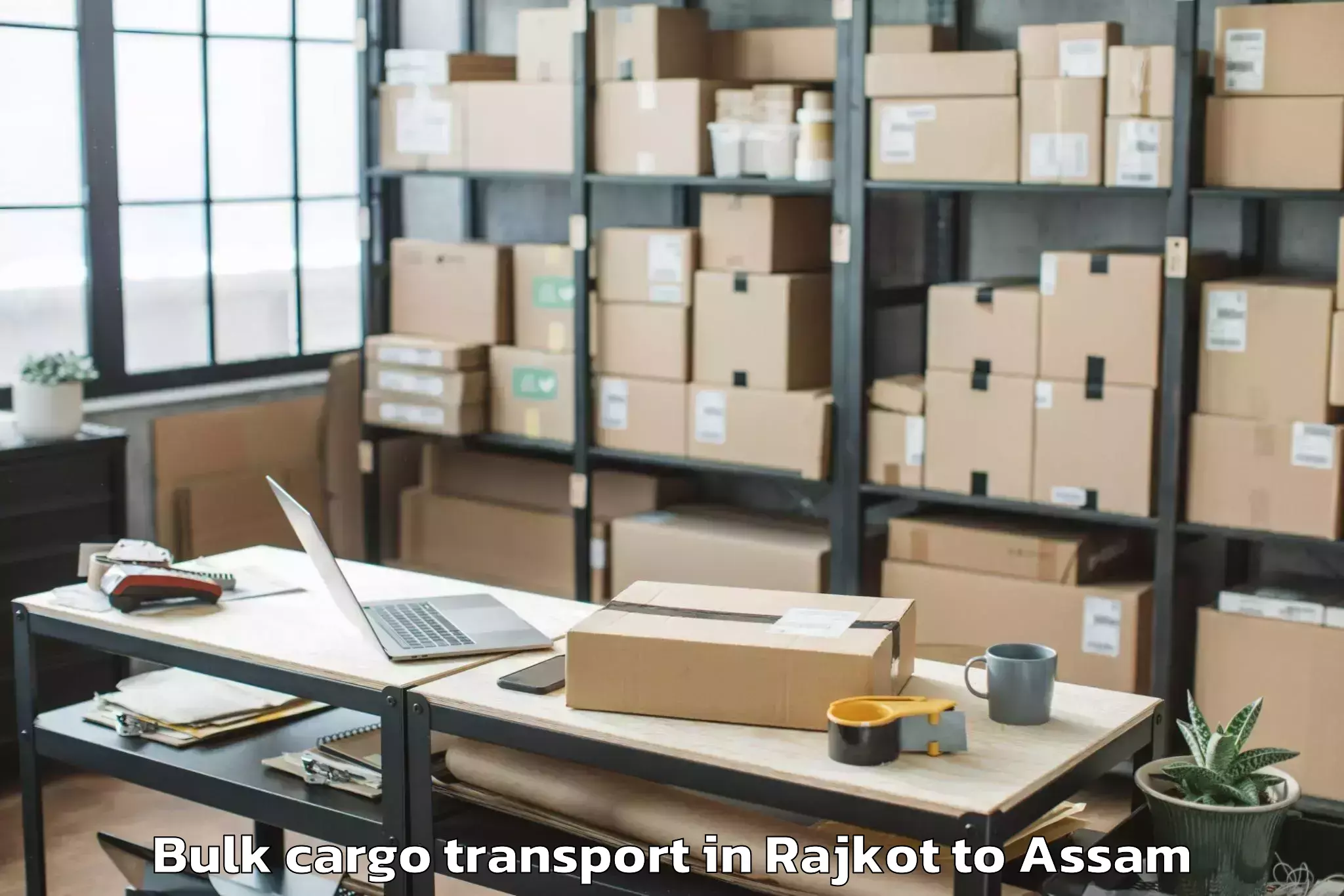 Reliable Rajkot to Marigaon Bulk Cargo Transport